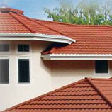 A close up of some windows and roof tiles